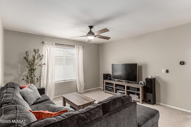 1257 W Calle Libro Del Retrato, Sahuarita, AZ 85629 - living area with light colored carpet, ceiling fan, and baseboards