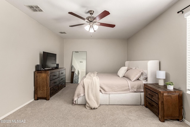 1257 W Calle Libro Del Retrato, Sahuarita, AZ 85629 - bedroom with light colored carpet, baseboards, and a ceiling fan