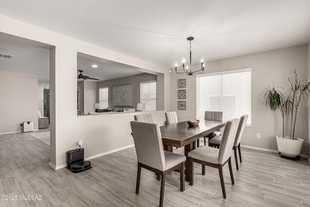 1257 W Calle Libro Del Retrato, Sahuarita, AZ 85629 - dining room with a chandelier, light wood-style floors, baseboards, recessed lighting, and ceiling fan