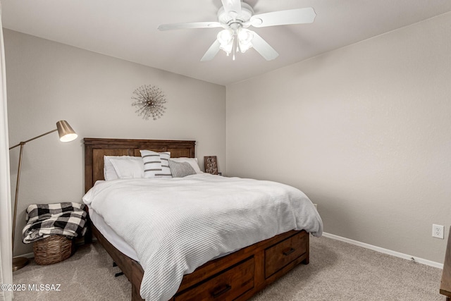 1257 W Calle Libro Del Retrato, Sahuarita, AZ 85629 - bedroom with light colored carpet, baseboards, and ceiling fan