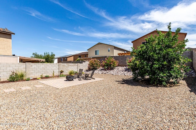 1257 W Calle Libro Del Retrato, Sahuarita, AZ 85629 - fenced backyard with an outdoor fire pit and a patio