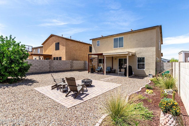 1257 W Calle Libro Del Retrato, Sahuarita, AZ 85629 - rear view of property with an outdoor fire pit, stucco siding, a patio area, and a fenced backyard