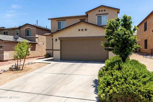 1257 W Calle Libro Del Retrato, Sahuarita, AZ 85629 - view of front facade with stucco siding, driveway, and an attached garage