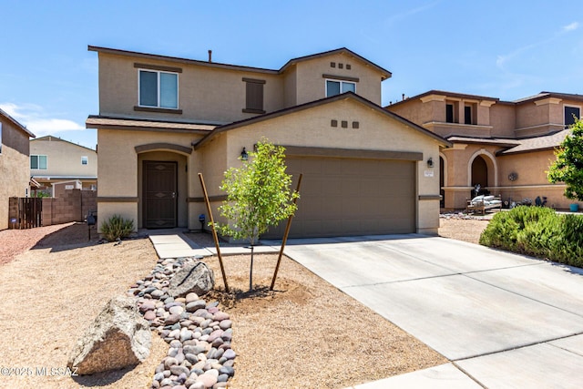1257 W Calle Libro Del Retrato, Sahuarita, AZ 85629 - view of front of home with stucco siding, a garage, and concrete driveway