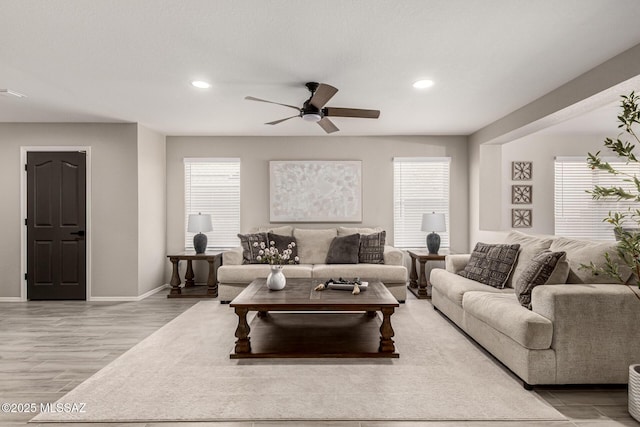 1257 W Calle Libro Del Retrato, Sahuarita, AZ 85629 - living area with healthy amount of natural light, a ceiling fan, baseboards, light wood finished floors, and recessed lighting