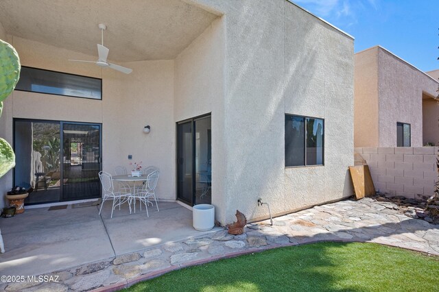 4996 N Valle Rd, Tucson, AZ 85750 - back of house featuring a patio area, stucco siding, and a ceiling fan