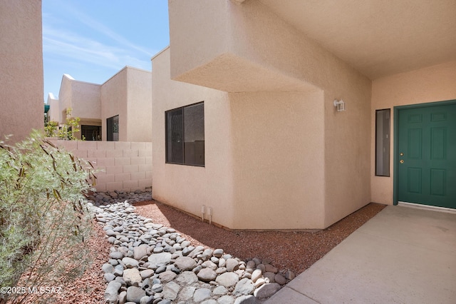 4996 N Valle Rd, Tucson, AZ 85750 - doorway to property featuring stucco siding and electric panel