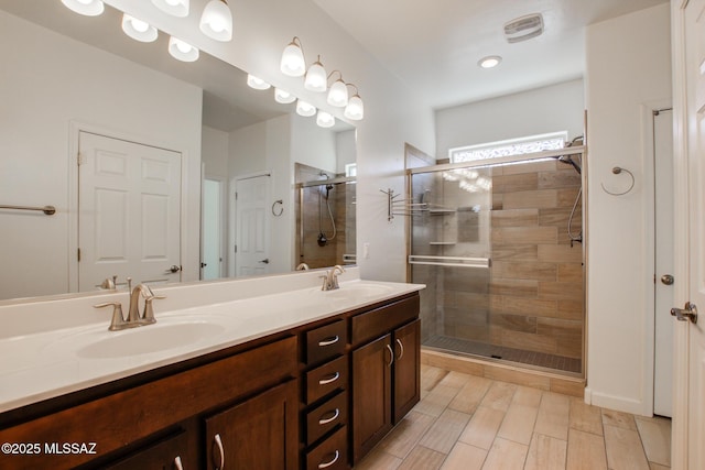 9016 W Birchover Dr, Marana, AZ 85653 - bathroom with a stall shower and double vanity