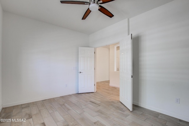 9016 W Birchover Dr, Marana, AZ 85653 - unfurnished room featuring ceiling fan, light wood-type flooring, and baseboards