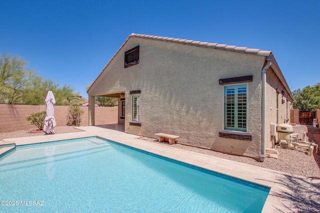 9016 W Birchover Dr, Marana, AZ 85653 - view of swimming pool featuring a fenced backyard and a patio area