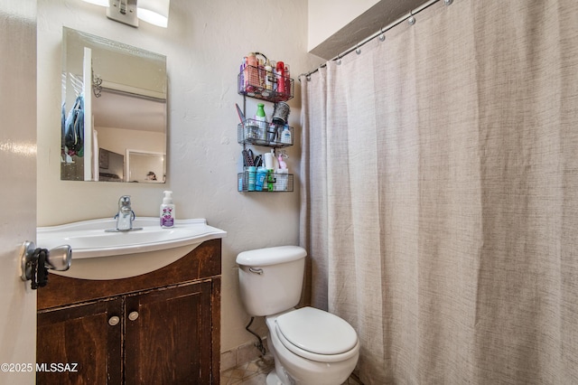 1410 W Sonora St, Tucson, AZ 85745 - full bathroom featuring vanity, toilet, and tile patterned floors