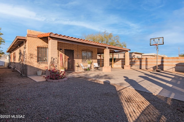 1410 W Sonora St, Tucson, AZ 85745 - back of house with a patio area and a tile roof