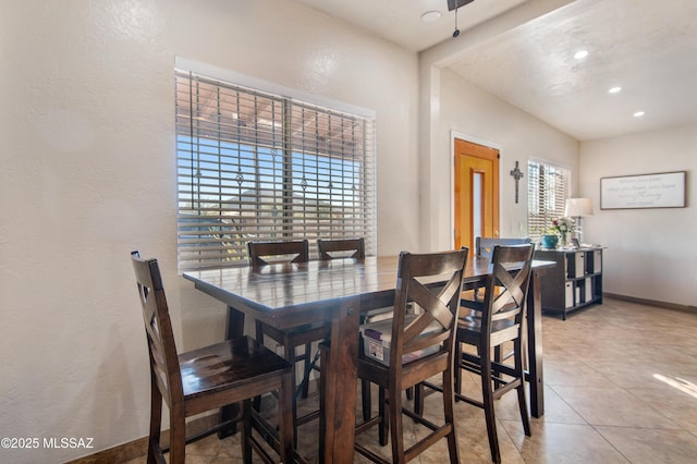 1410 W Sonora St, Tucson, AZ 85745 - dining area with baseboards, recessed lighting, a textured wall, and light tile patterned flooring