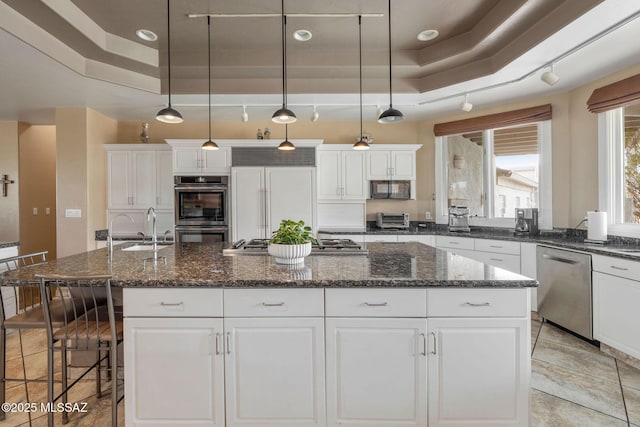 4141 W Camino Del Norte, Tucson, AZ 85742 - kitchen featuring a sink, appliances with stainless steel finishes, white cabinetry, a raised ceiling, and recessed lighting