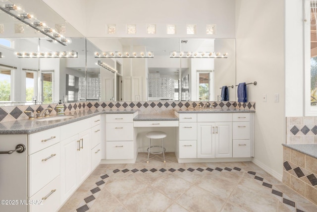 4141 W Camino Del Norte, Tucson, AZ 85742 - bathroom with tasteful backsplash, tile patterned flooring, and vanity