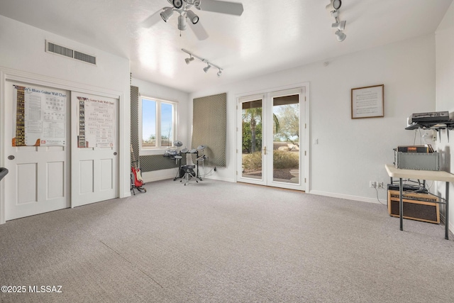 4141 W Camino Del Norte, Tucson, AZ 85742 - living area with rail lighting, carpet floors, ceiling fan, and baseboards