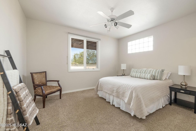 4141 W Camino Del Norte, Tucson, AZ 85742 - bedroom with multiple windows, light carpet, baseboards, and a ceiling fan