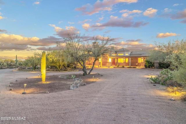 4141 W Camino Del Norte, Tucson, AZ 85742 - view of front facade featuring a tiled roof and a porch