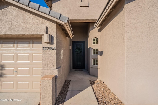12584 N Sunrise Shadow Dr, Marana, AZ 85658 - entrance to property featuring stucco siding