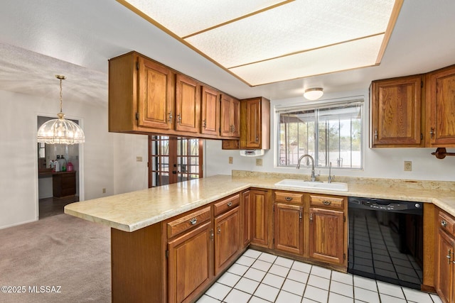 555 E Rudasill Rd, Tucson, AZ 85704 - kitchen with dishwasher, a sink, a peninsula, brown cabinetry, and light countertops