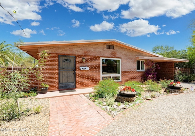 3225 E Elida St, Tucson, AZ 85716 - view of front of home with brick siding