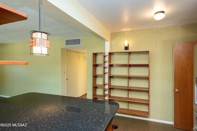 3225 E Elida St, Tucson, AZ 85716 - unfurnished dining area featuring dark wood-style flooring