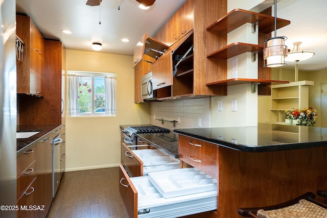 3225 E Elida St, Tucson, AZ 85716 - kitchen with open shelves, brown cabinets, decorative backsplash, modern cabinets, and recessed lighting
