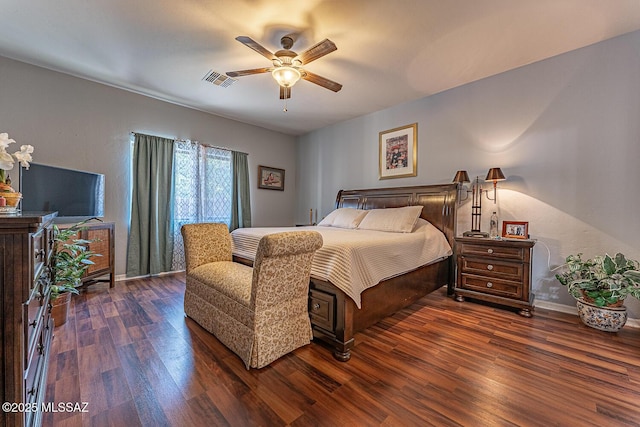493 W Corte Planga, Sahuarita, AZ 85629 - bedroom with wood finished floors, baseboards, and ceiling fan