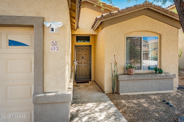 493 W Corte Planga, Sahuarita, AZ 85629 - doorway to property featuring stucco siding