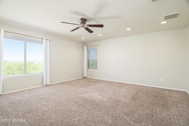 1070 W Camino Fijo, Sahuarita, AZ 85629 - carpeted spare room with a ceiling fan, recessed lighting, and baseboards