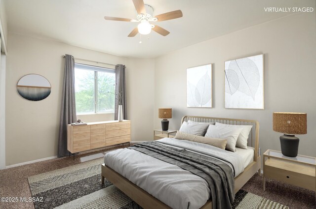 1070 W Camino Fijo, Sahuarita, AZ 85629 - carpeted bedroom featuring baseboards and a ceiling fan