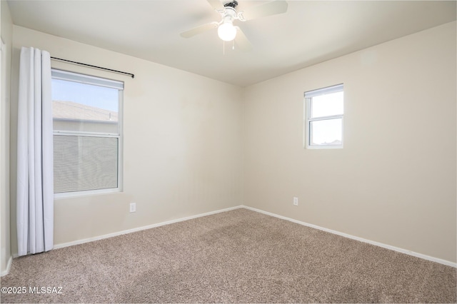 1070 W Camino Fijo, Sahuarita, AZ 85629 - carpeted spare room with baseboards and a ceiling fan