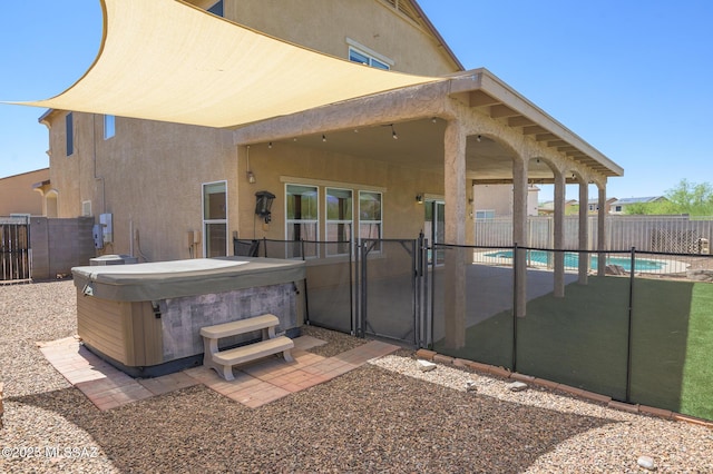 1070 W Camino Fijo, Sahuarita, AZ 85629 - view of swimming pool featuring a hot tub, a patio, and a fenced backyard