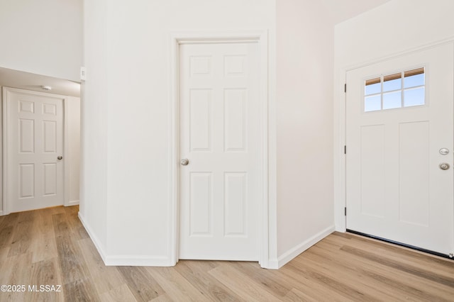 7112 S Haskins Dr, Tucson, AZ 85746 - entrance foyer with light wood finished floors and baseboards