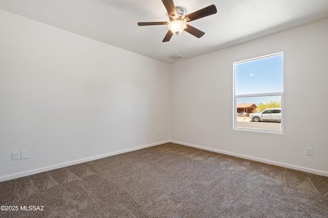 7112 S Haskins Dr, Tucson, AZ 85746 - empty room featuring carpet floors, baseboards, and a ceiling fan