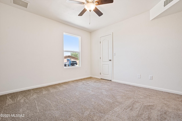 7112 S Haskins Dr, Tucson, AZ 85746 - carpeted spare room with ceiling fan and baseboards
