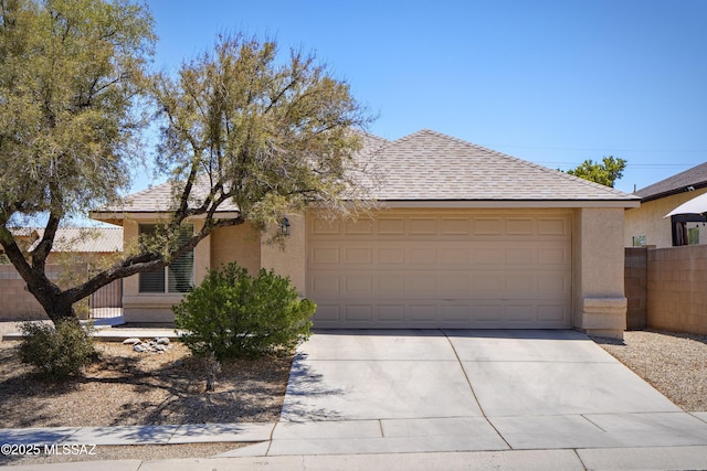 1542 N Amberbrooke Ave, Tucson, AZ 85745 - view of front of property with concrete driveway, an attached garage, and stucco siding