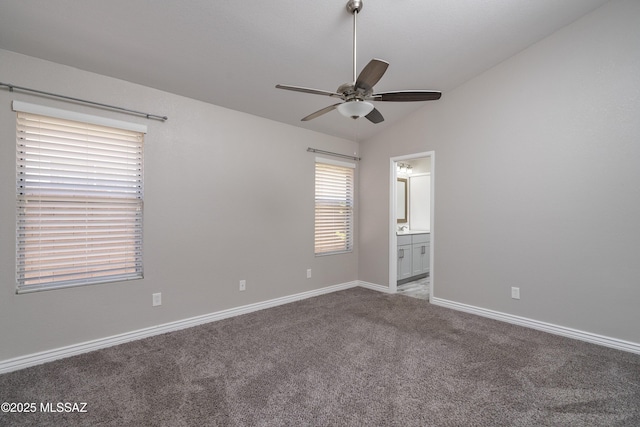 1542 N Amberbrooke Ave, Tucson, AZ 85745 - carpeted spare room featuring ceiling fan, baseboards, and vaulted ceiling