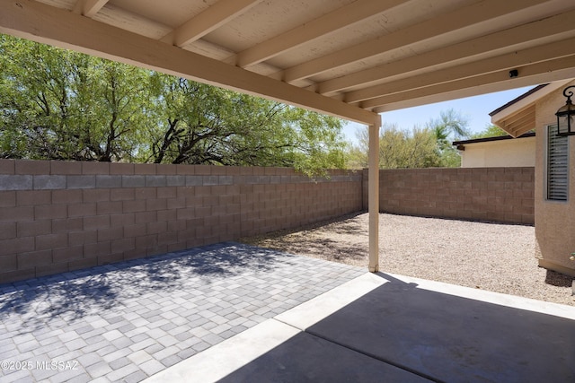 1542 N Amberbrooke Ave, Tucson, AZ 85745 - fenced backyard with a patio