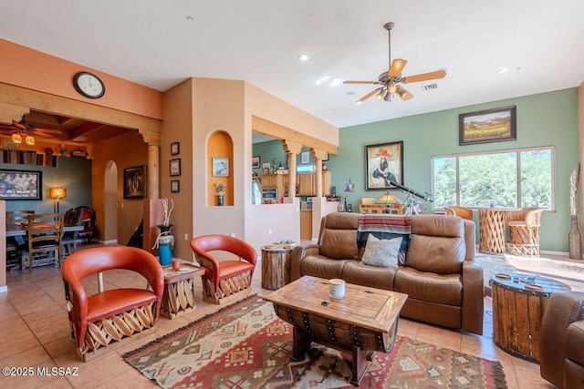 489 W Wedge Way, Green Valley, AZ 85614 - tiled living room featuring a ceiling fan, arched walkways, and recessed lighting