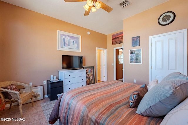 489 W Wedge Way, Green Valley, AZ 85614 - bedroom with tile patterned floors and a ceiling fan