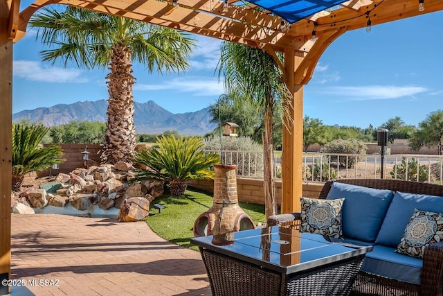 489 W Wedge Way, Green Valley, AZ 85614 - view of patio featuring a pergola, a mountain view, and an outdoor living space
