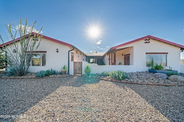 4 Mustang Trl, Sonoita, AZ 85637 - mediterranean / spanish-style home featuring stucco siding and a gate