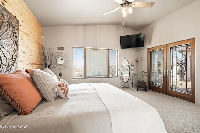 4 Mustang Trl, Sonoita, AZ 85637 - carpeted bedroom featuring french doors, access to exterior, lofted ceiling, wooden walls, and ceiling fan