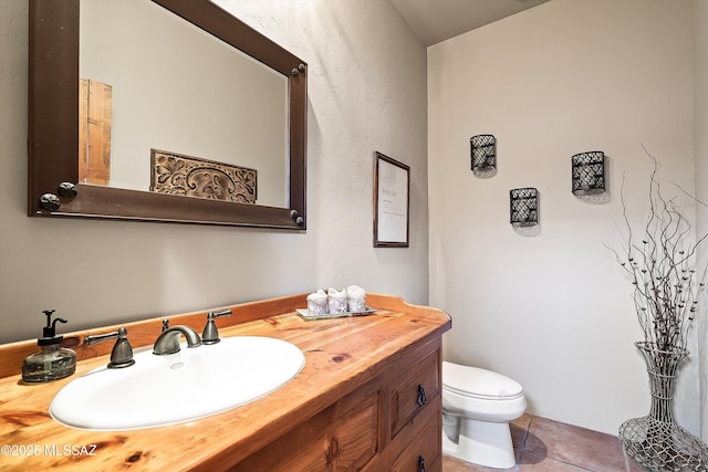 4 Mustang Trl, Sonoita, AZ 85637 - bathroom featuring toilet, vanity, and tile patterned floors