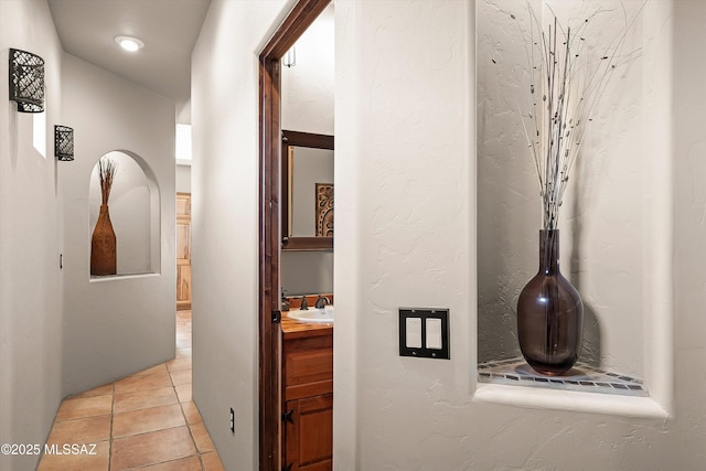 4 Mustang Trl, Sonoita, AZ 85637 - corridor with a sink and light tile patterned flooring