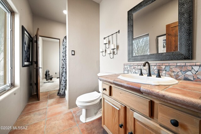 4 Mustang Trl, Sonoita, AZ 85637 - bathroom with vanity, toilet, decorative backsplash, a shower with curtain, and tile patterned floors