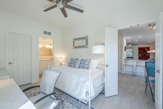 6655 N Canyon Crest Dr NE Unit 6130, Tucson, AZ 85750 - bedroom with ensuite bathroom and ceiling fan