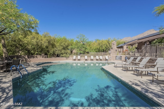 6655 N Canyon Crest Dr NE Unit 6130, Tucson, AZ 85750 - community pool with a patio
