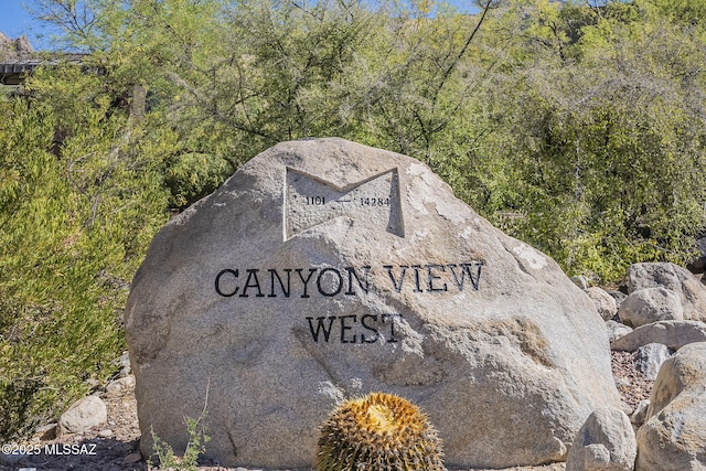 6655 N Canyon Crest Dr NE Unit 6130, Tucson, AZ 85750 - community / neighborhood sign with a wooded view